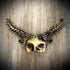 A metallic gold spike goat horn masquerade mask for women